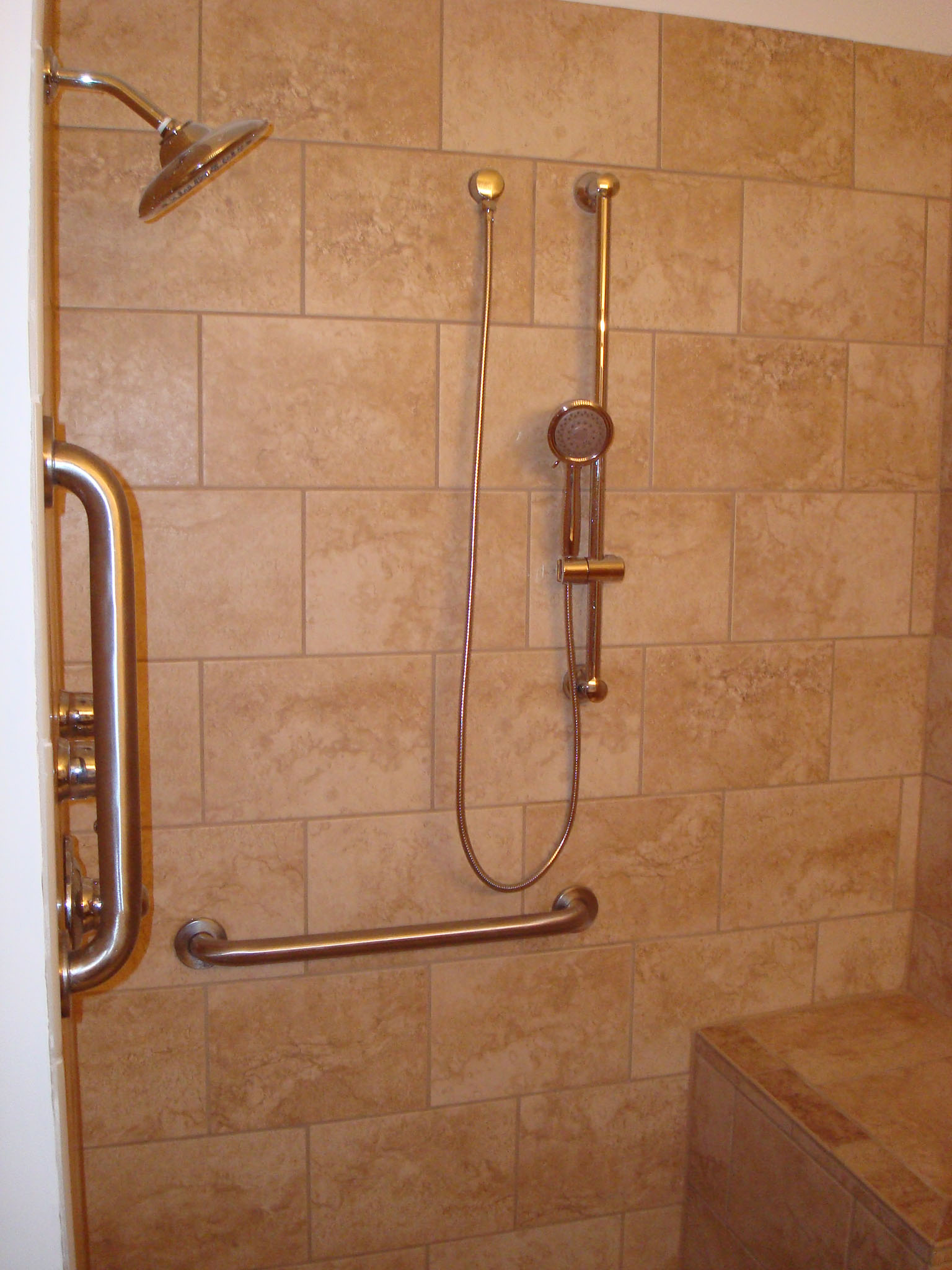 Accessible handicap bathroom remodel with walk-in shower and grab bars