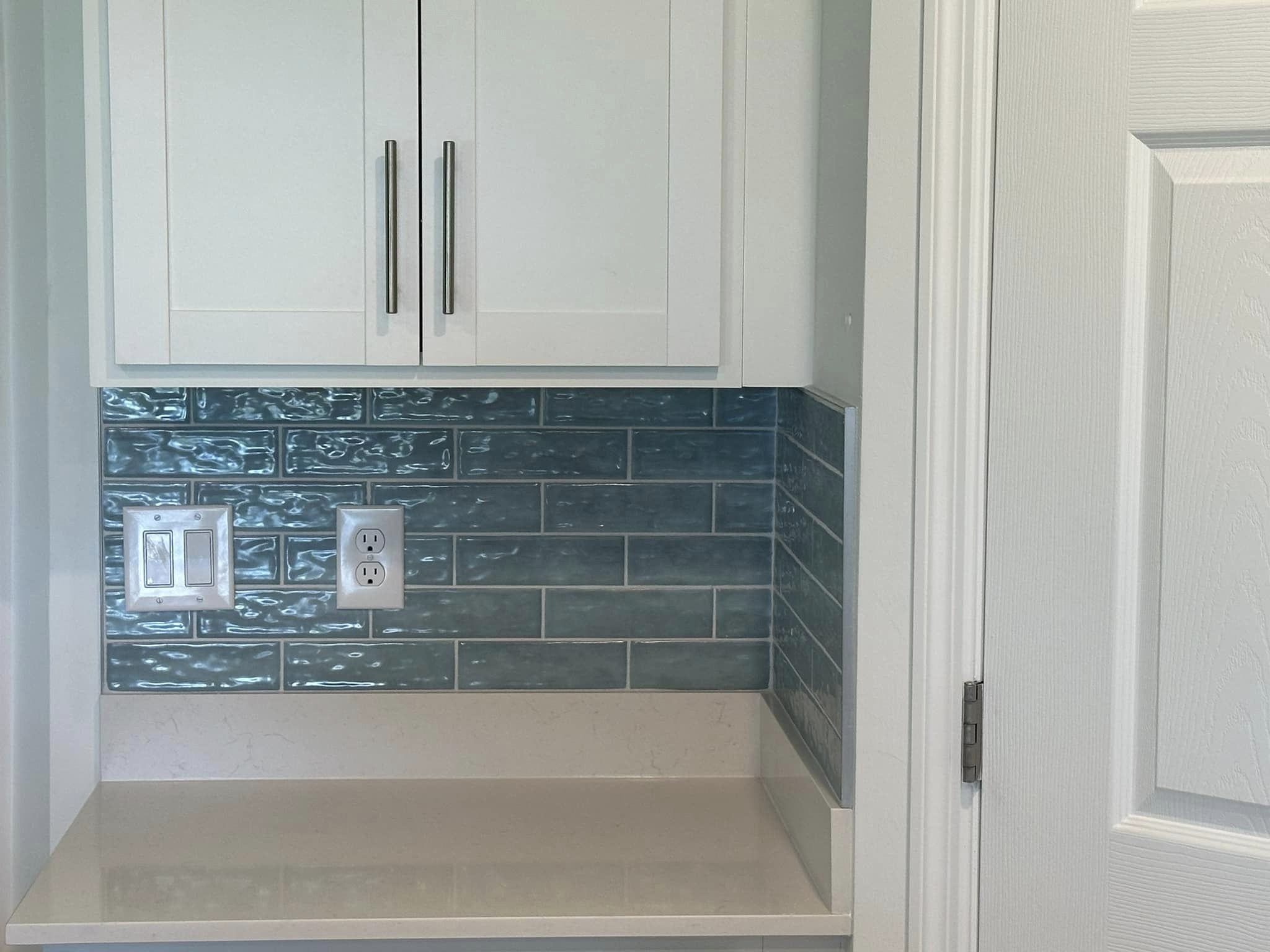 Blue glass kitchen backsplash install