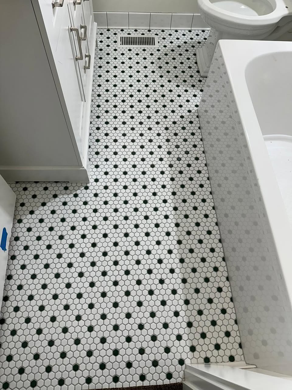 Ornate double entry doors with transom window in a Palm Coast home