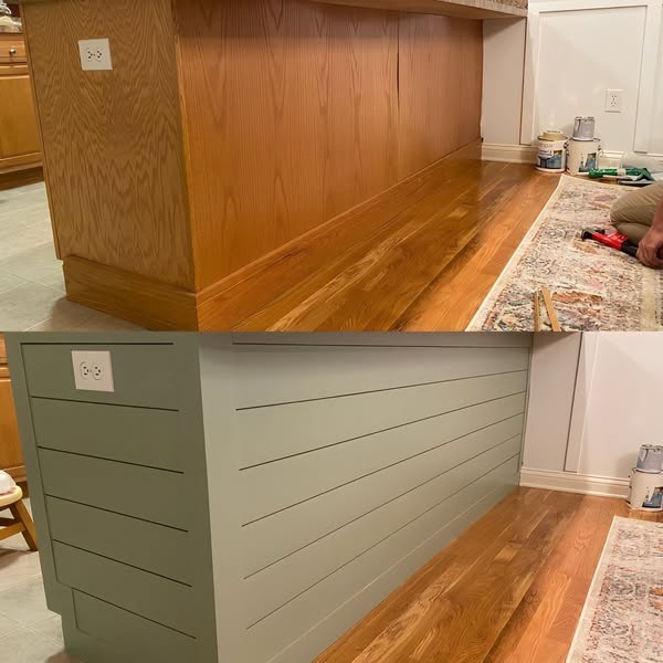 Green shiplap-wrapped kitchen island