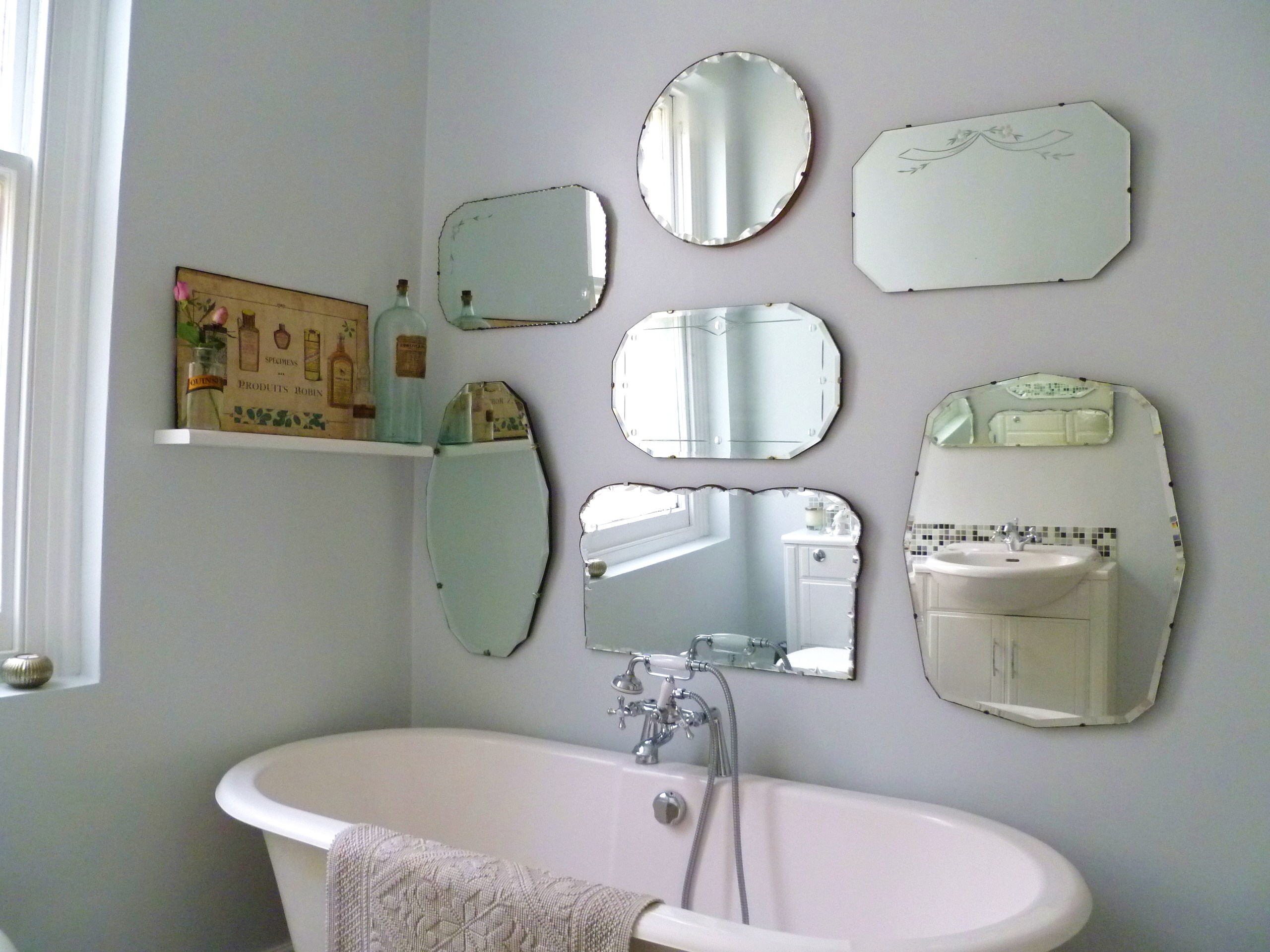 Large mirror hanging by Jeff Handyman