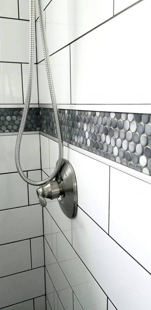 Shower accessory niche with penny tile back and valve trim, clean tile lines