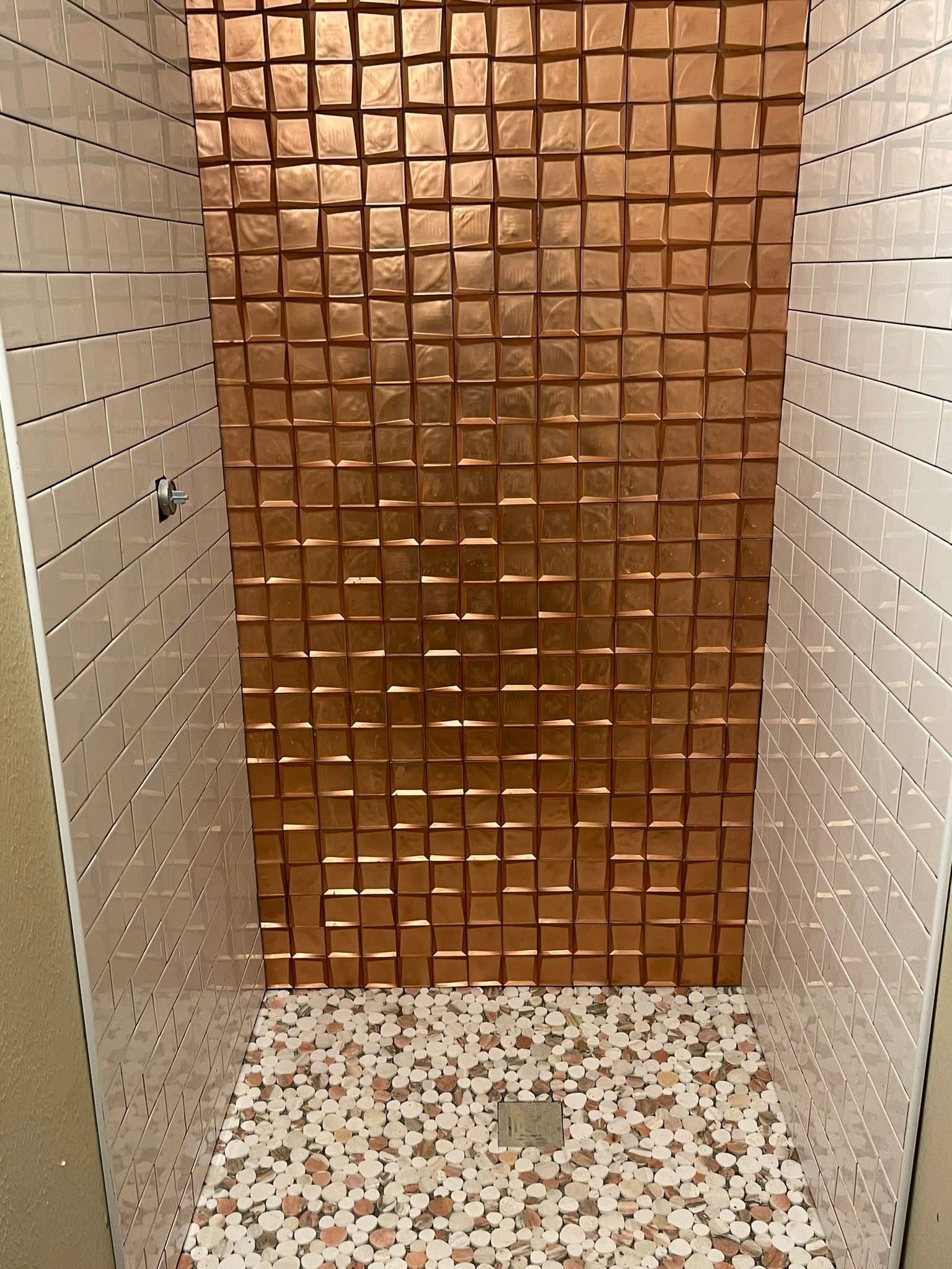 Teal custom built-in cabinet and shelving with decorative storage