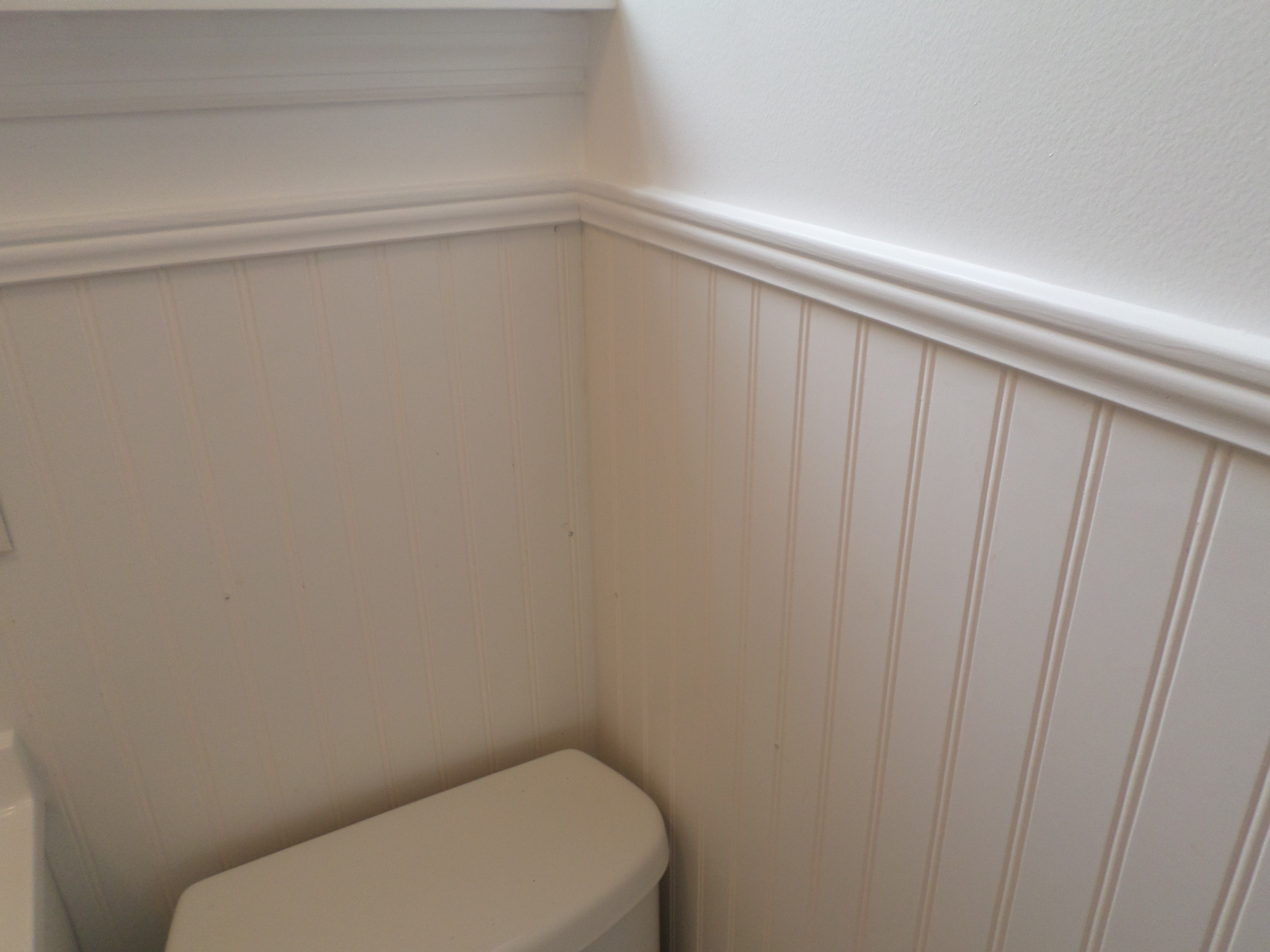 Close-up detail of custom wainscoting carpentry